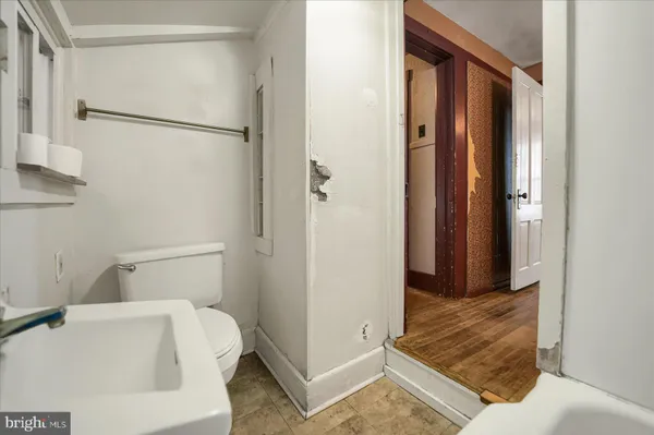 a bathroom with a sink and a shower