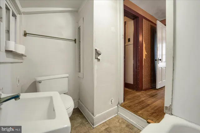 a bathroom with a sink and a shower