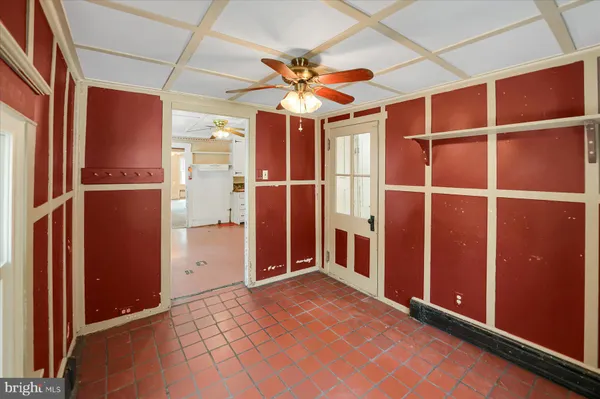 a view of a hallway with closet