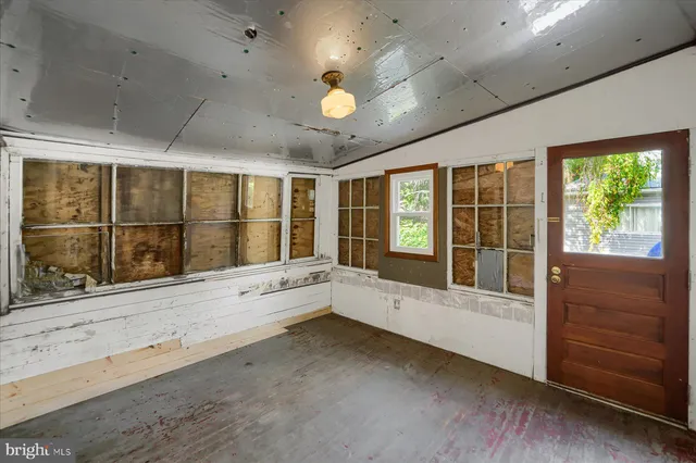 a large white room with a large window