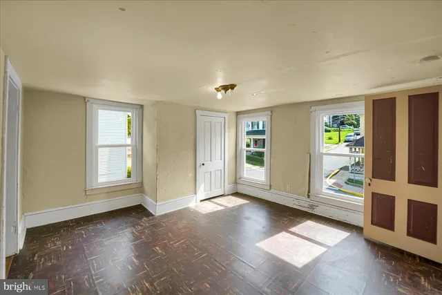 an empty room with windows