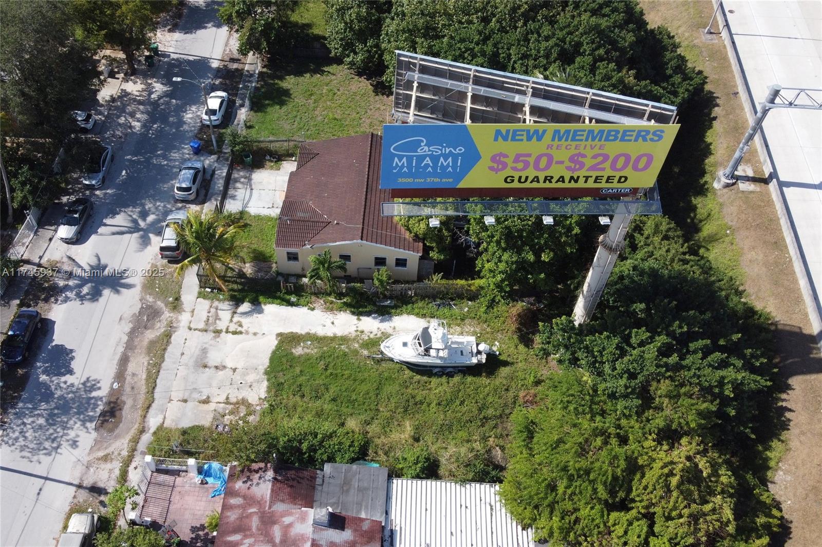 321 Northwest 37th Street Miami, FL 33127 - Photo 13 of 49 an aerial view of houses with yard