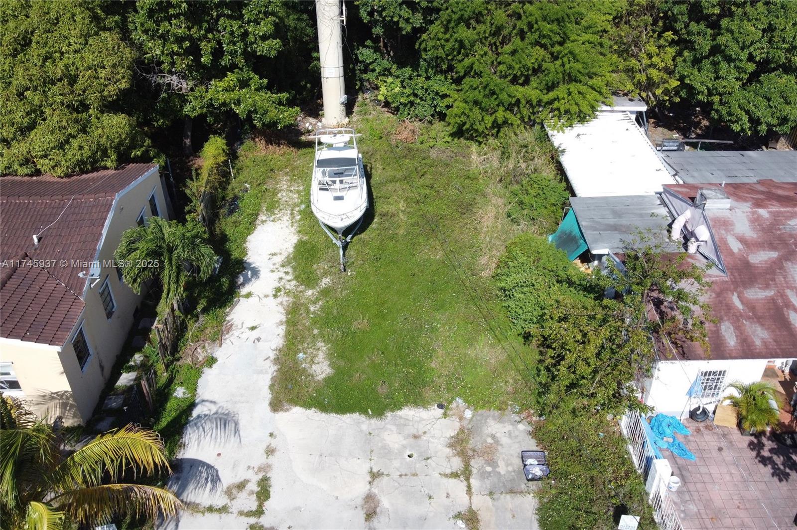 321 Northwest 37th Street Miami, FL 33127 - Photo 15 of 49 an aerial view of a house with outdoor space