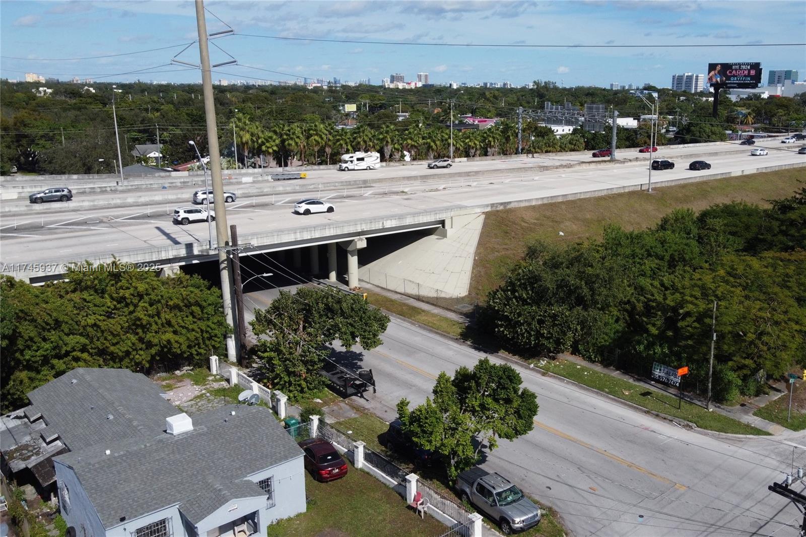 321 Northwest 37th Street Miami, FL 33127 - Photo 21 of 49 a view of a street with houses