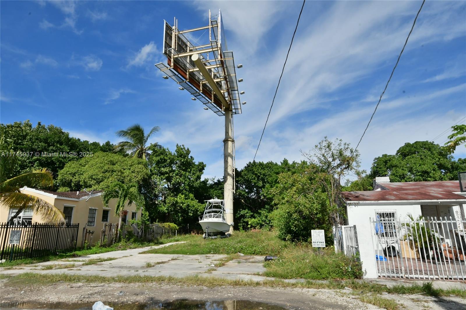 321 Northwest 37th Street Miami, FL 33127 - Photo 32 of 49 a front view of a house with a yard