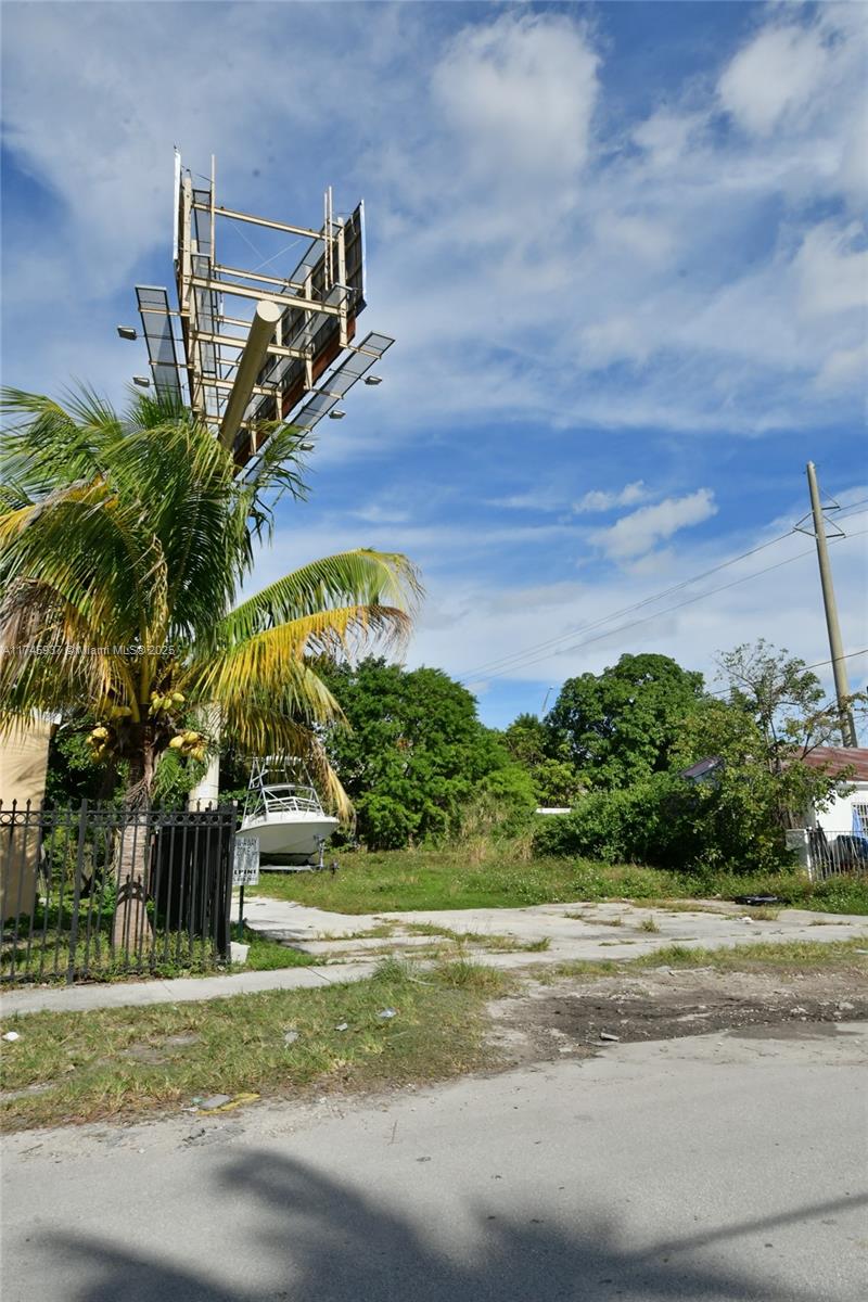 321 Northwest 37th Street Miami, FL 33127 - Photo 35 of 49 a front view of a house with a yard