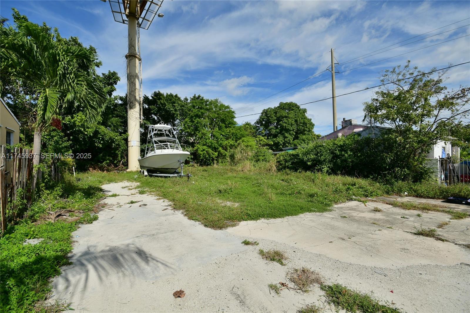 321 Northwest 37th Street Miami, FL 33127 - Photo 37 of 49 a view of a garden with a tree