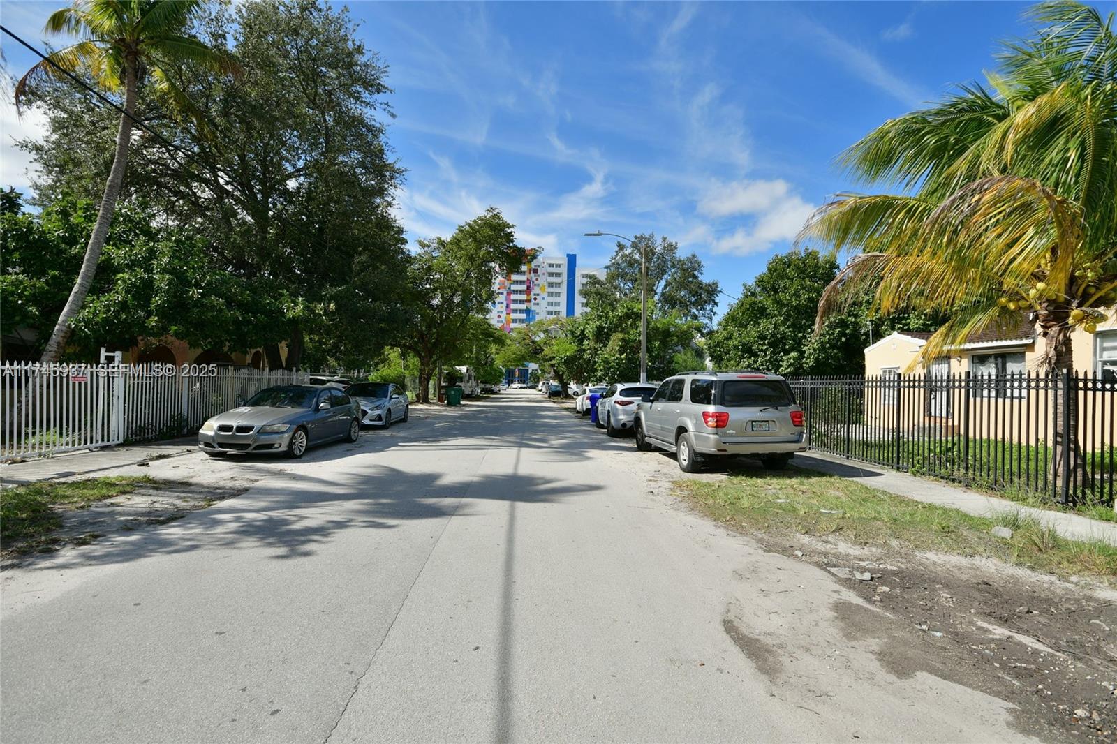 321 Northwest 37th Street Miami, FL 33127 - Photo 42 of 49 a view of street with parked cars