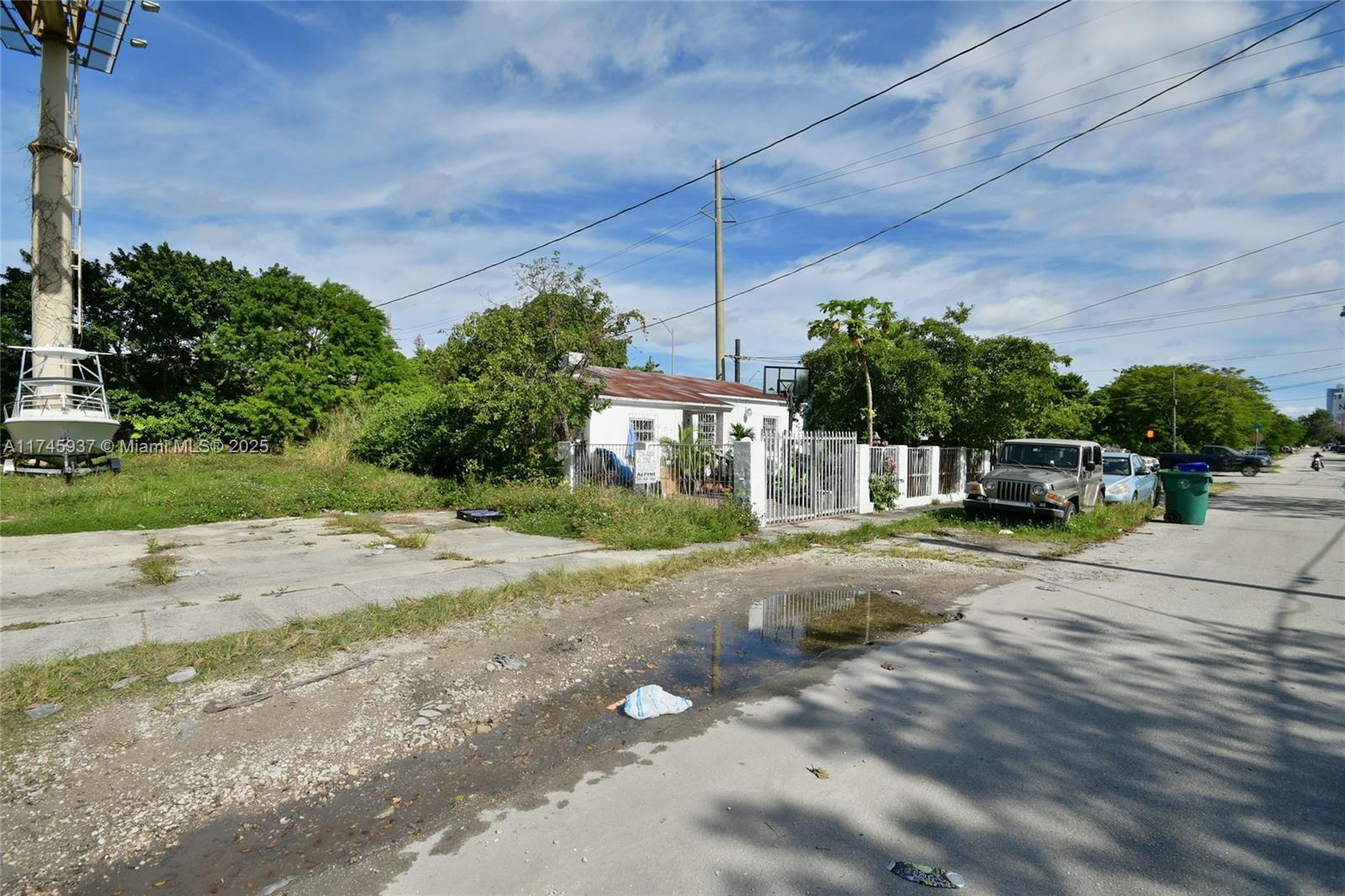 321 Northwest 37th Street Miami, FL 33127 - Photo 45 of 49 a view of a street with houses