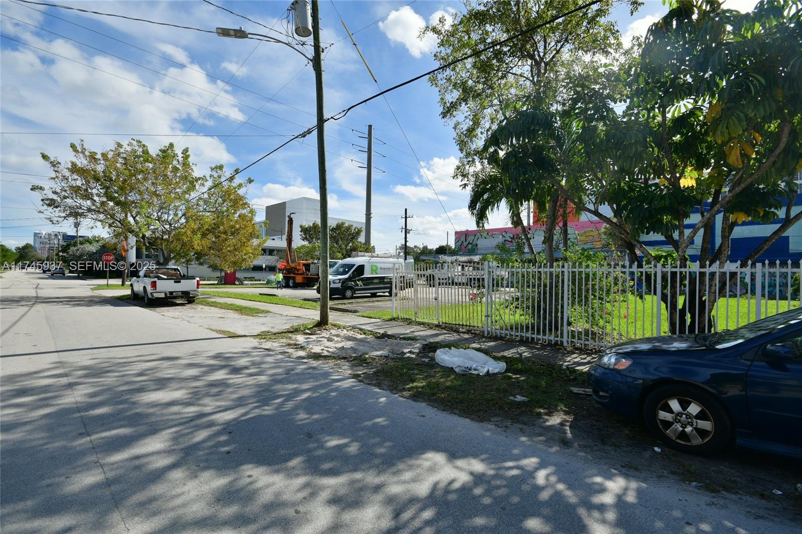 321 Northwest 37th Street Miami, FL 33127 - Photo 47 of 49 a view of a park with swings and slides