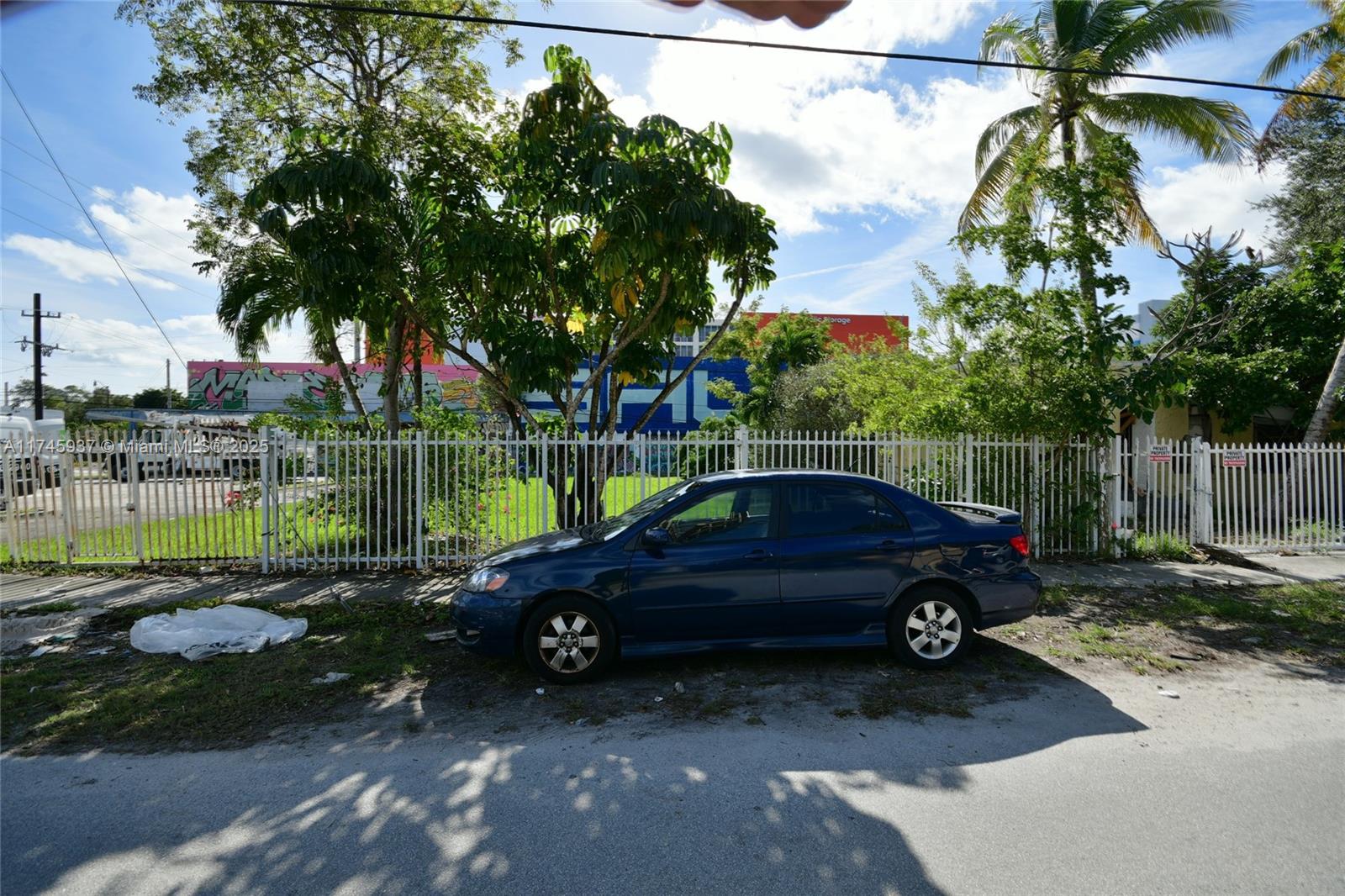 321 Northwest 37th Street Miami, FL 33127 - Photo 48 of 49 a car parked in the middle of a park