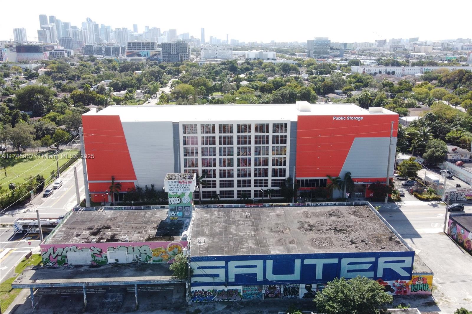 321 Northwest 37th Street Miami, FL 33127 - Photo 6 of 49 an aerial view of a house with a yard and seating space