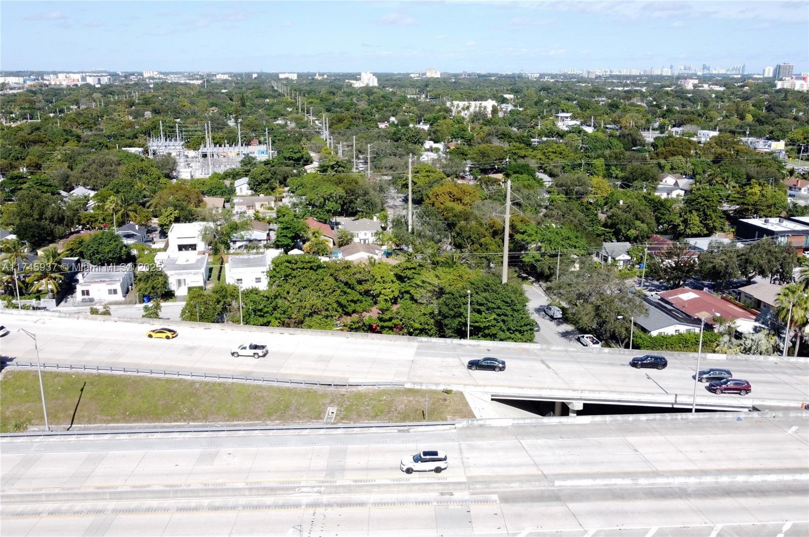 321 Northwest 37th Street Miami, FL 33127 - Photo 10 of 49 a view of building with trees