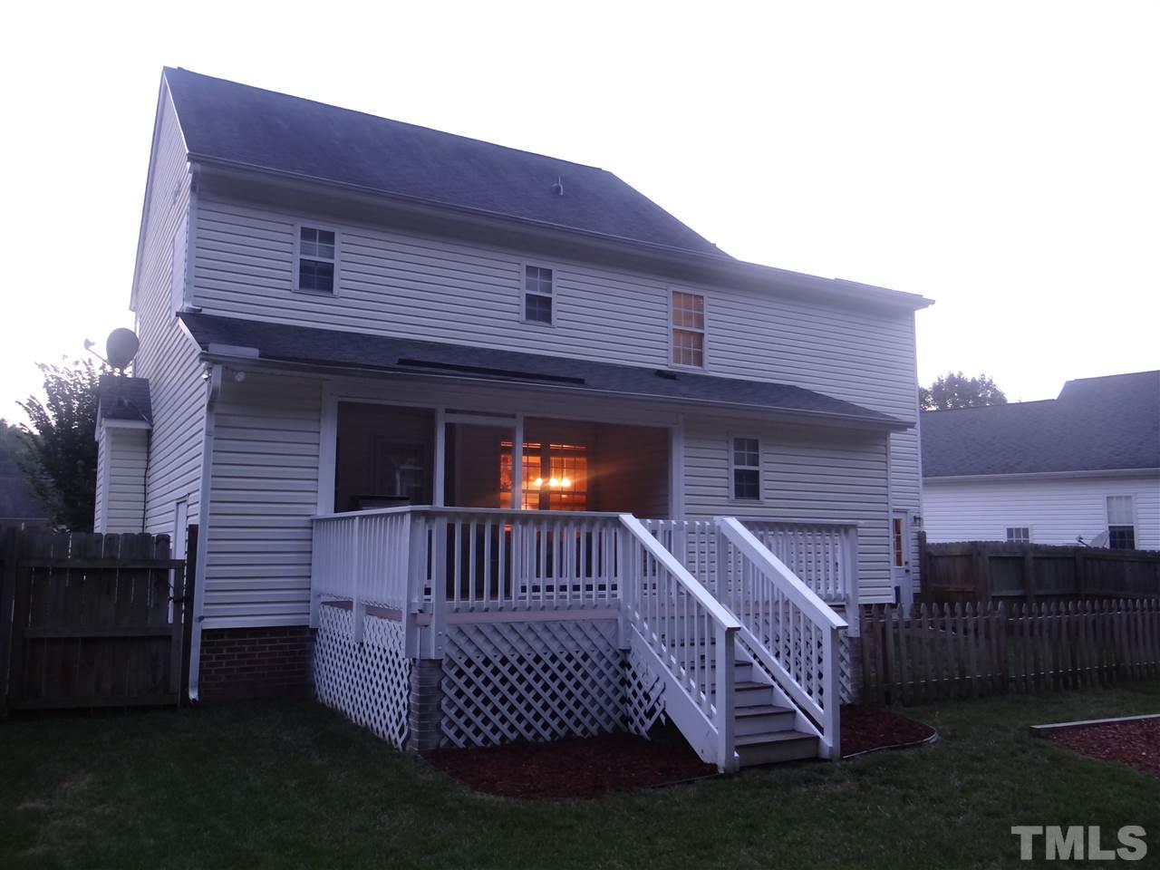 4208 Wolftrap Road Raleigh, NC 27616 - Photo 2 of 23 a front view of a house with a yard