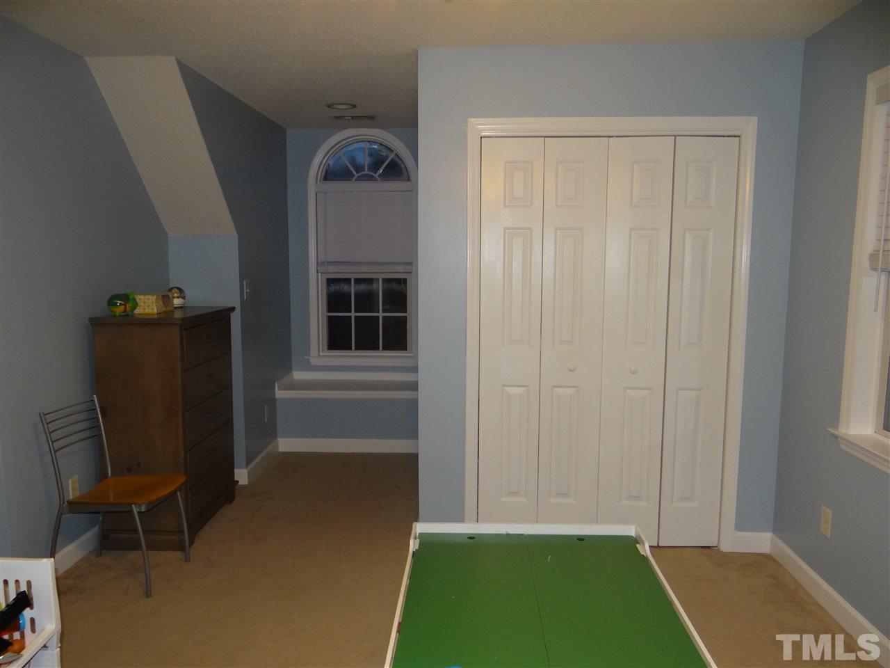4208 Wolftrap Road Raleigh, NC 27616 - Photo 20 of 23 a view of livingroom with furniture and a window