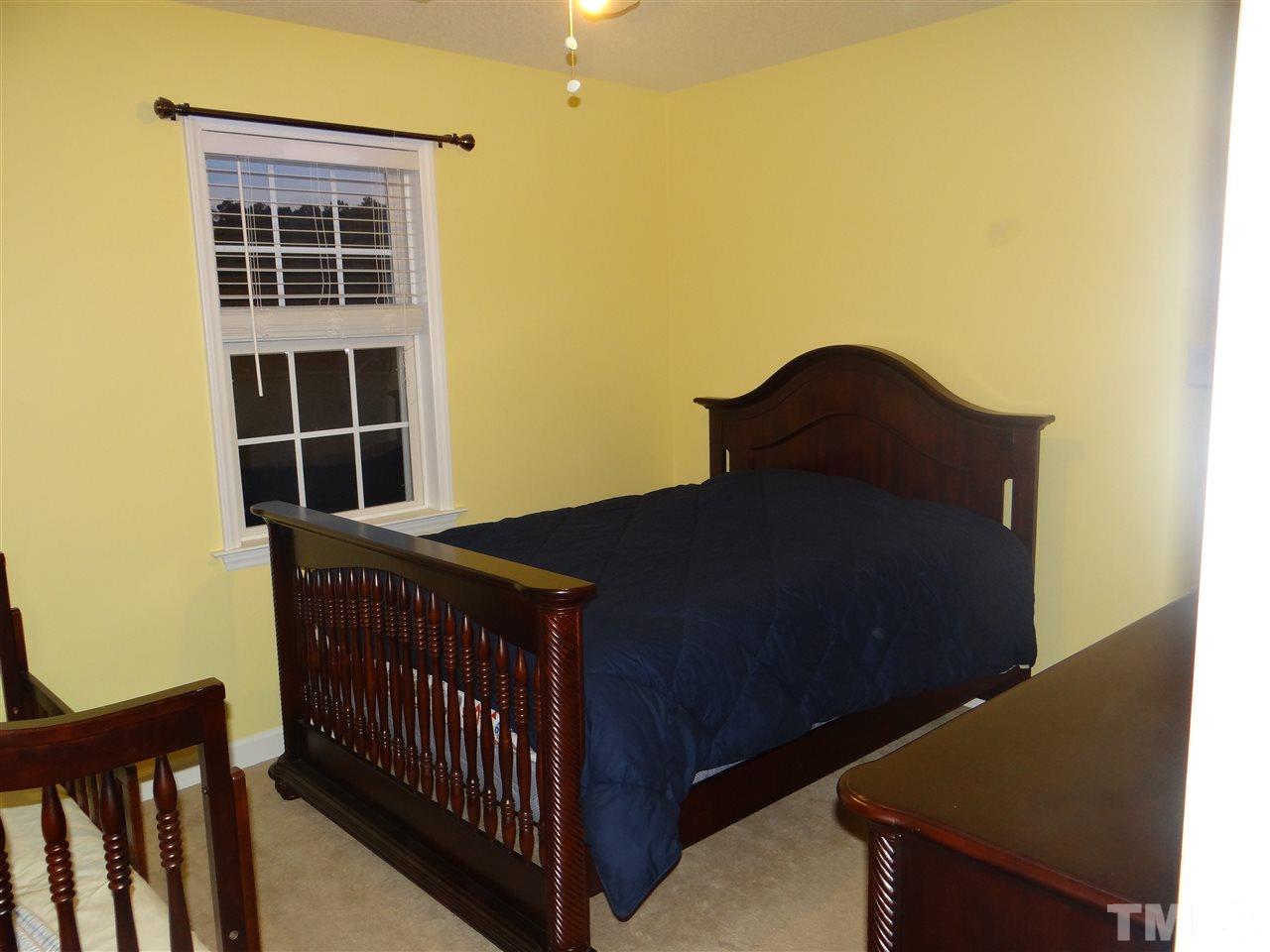 4208 Wolftrap Road Raleigh, NC 27616 - Photo 21 of 23 a balcony view with a black gate