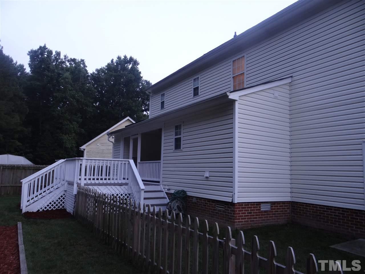 4208 Wolftrap Road Raleigh, NC 27616 - Photo 5 of 23 a view of a house with a deck