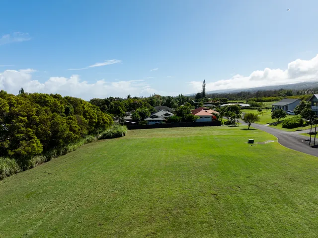 a view of a golf course with a garden