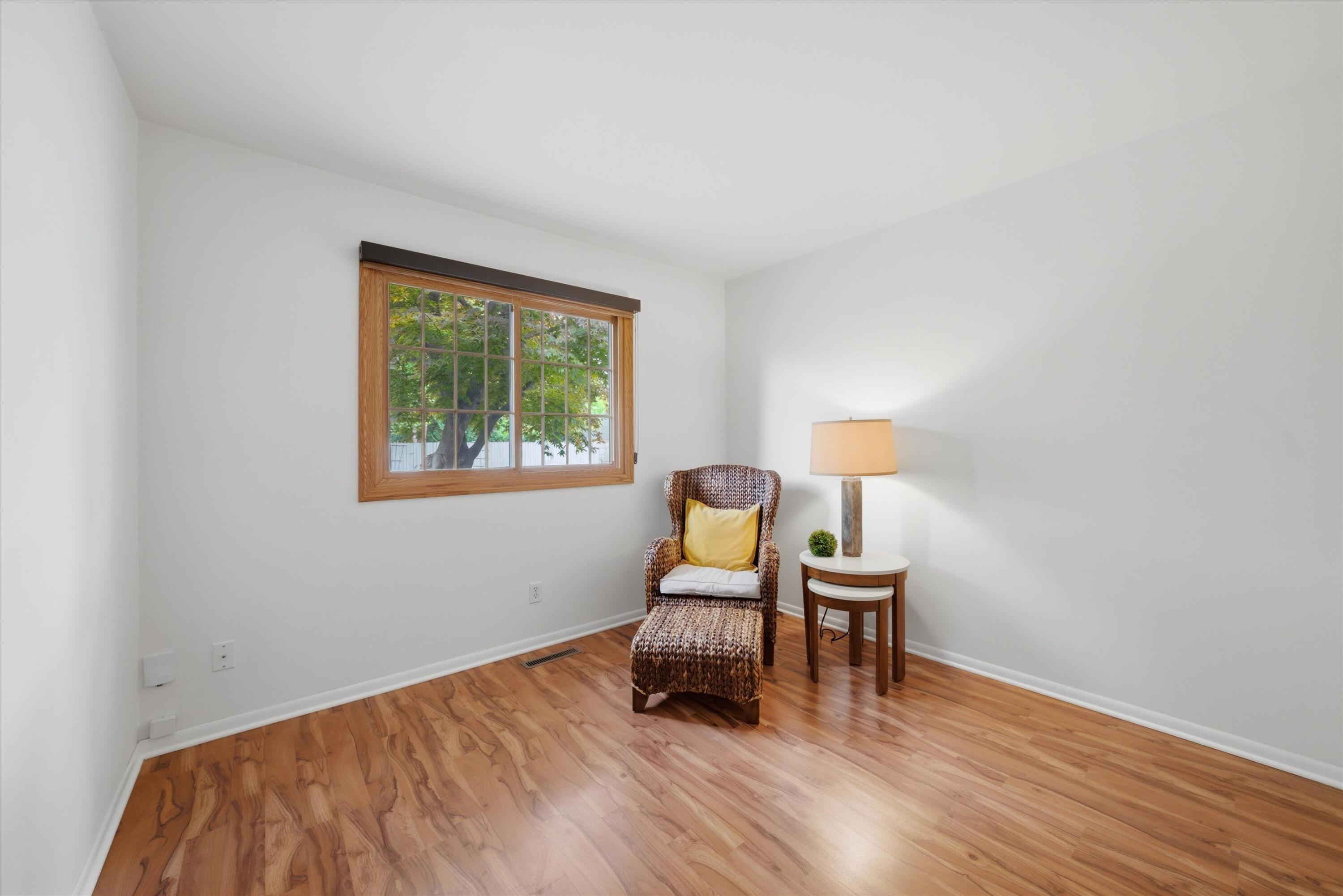 1034 North Indiana Street Griffith, IN 46319 - Photo 11 of 17 a room with a window and a lamp