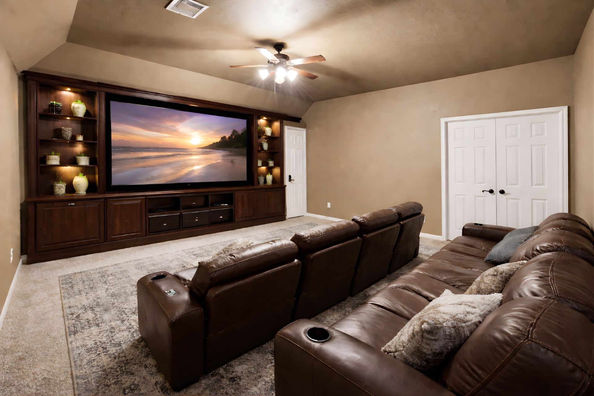 8169 Tranquil Lake Way Conroe, TX 77385 - Photo 16 of 26 a living room with furniture and a flat screen tv