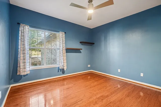 a view of empty room with a window