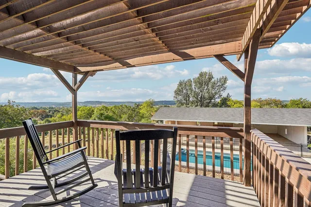 a view of a terrace with a lake view