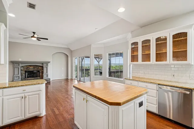 a kitchen with a stove and a sink