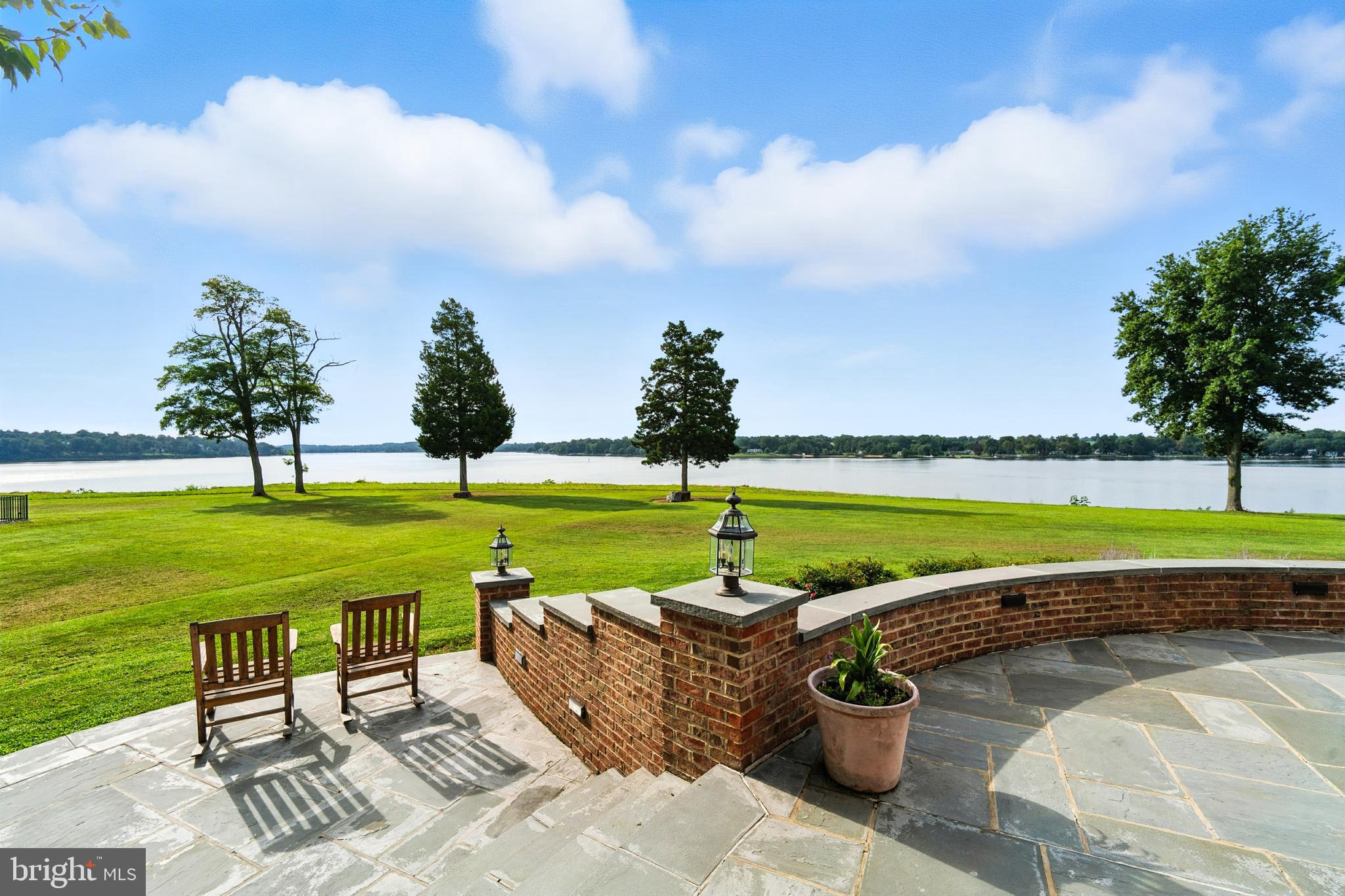 750 Cassidy Wharf Road Earleville, MD 21919 - Photo 16 of 143 Patio and Lawn overlooking the Sassafras River
