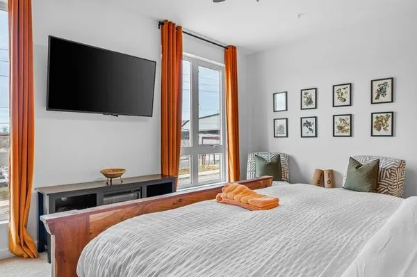 a bathroom with a glass shower door