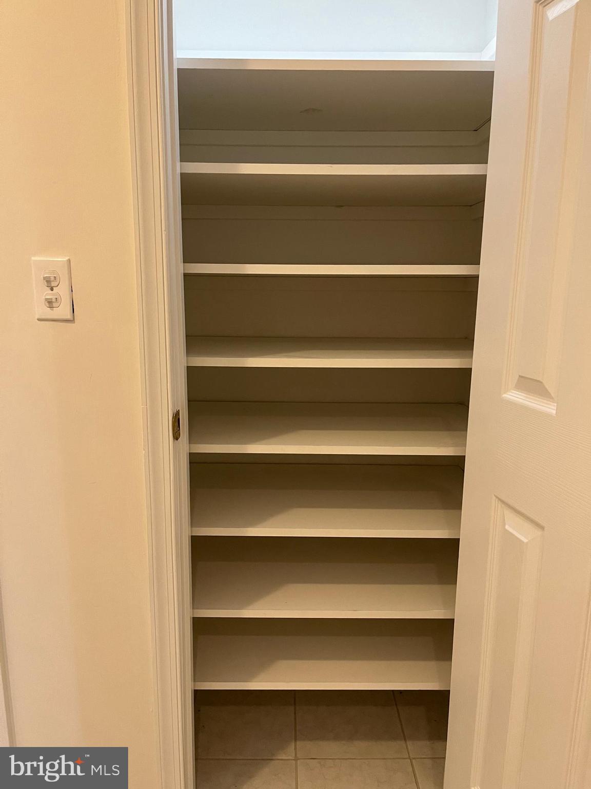 20 Mabel Lane Martinsburg, WV 25404 - Photo 11 of 30 a view of walk in closet with empty racks