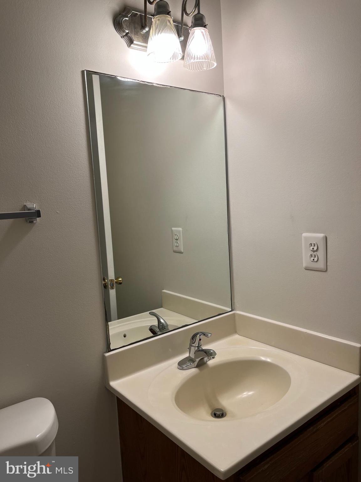 20 Mabel Lane Martinsburg, WV 25404 - Photo 26 of 30 a bathroom with a sink and a mirror