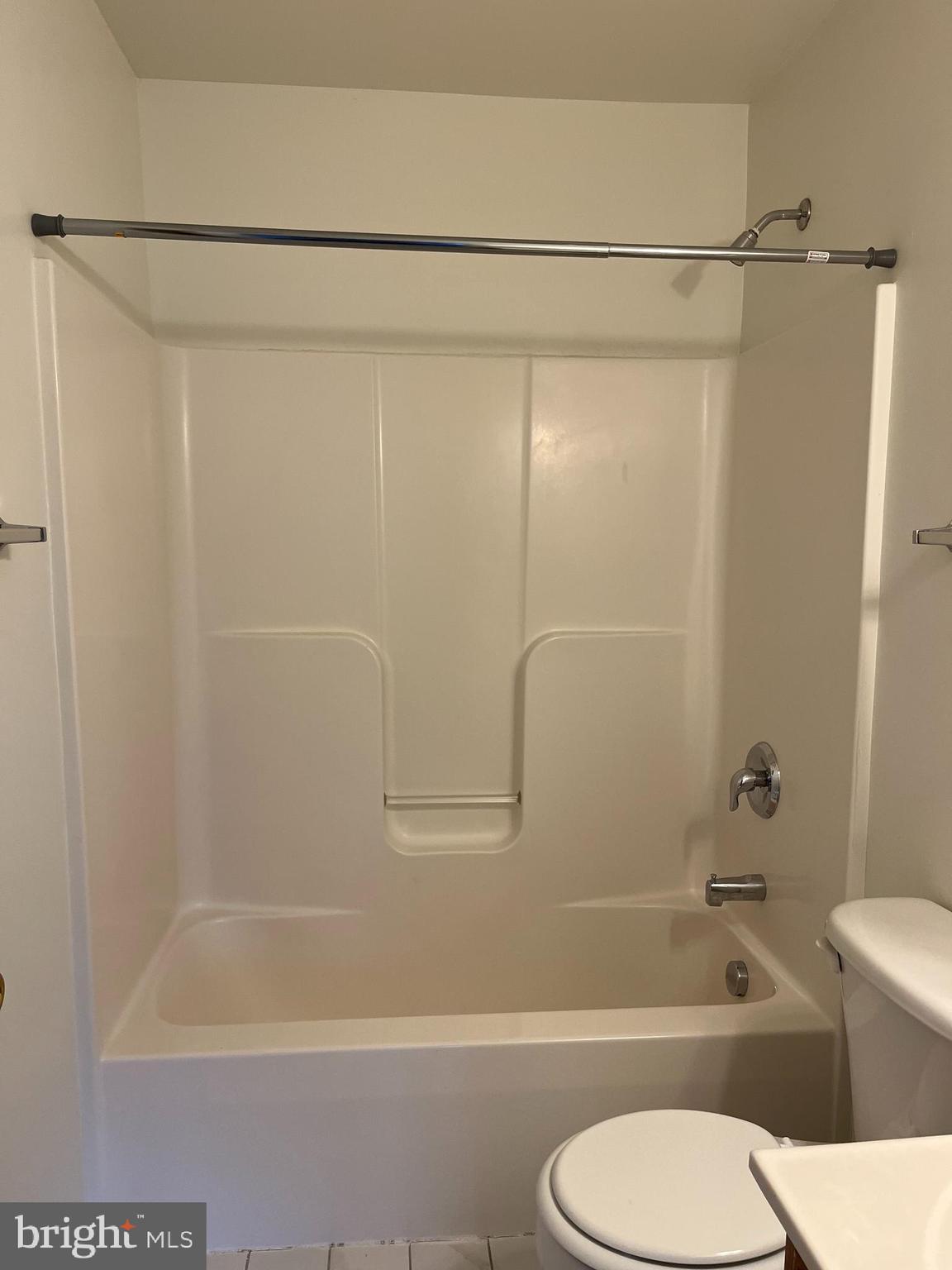 20 Mabel Lane Martinsburg, WV 25404 - Photo 29 of 30 a bathroom with a shower a toilet and a bath tub