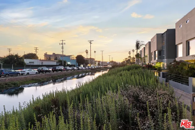 a view of a lake with a city