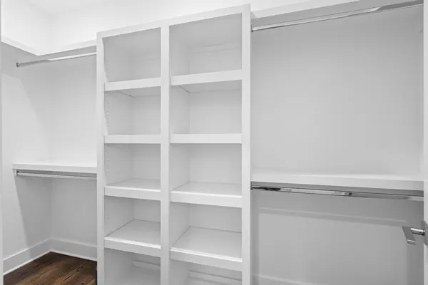 a view of an empty walk in closet