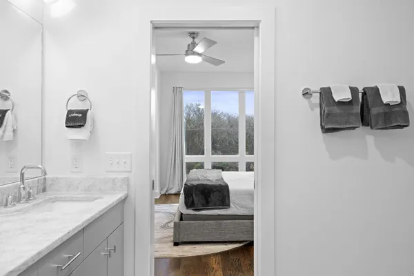 a en suite bathroom with a sink and a mirror