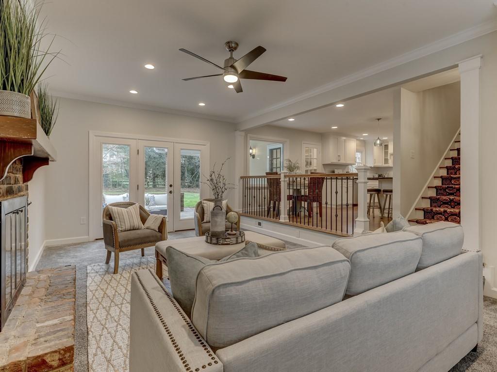 4234 Chevington Road Charlotte, NC 28226 - Photo 21 of 46 a living room with furniture kitchen view and a large window
