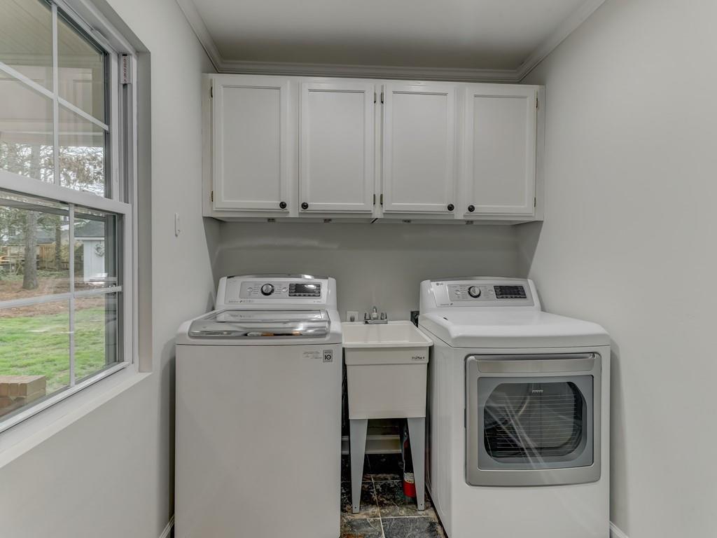 4234 Chevington Road Charlotte, NC 28226 - Photo 24 of 46 a utility room with dryer and washer