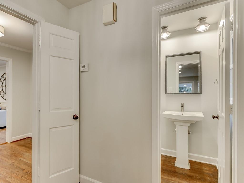 4234 Chevington Road Charlotte, NC 28226 - Photo 25 of 46 a bathroom with a sink and a mirror