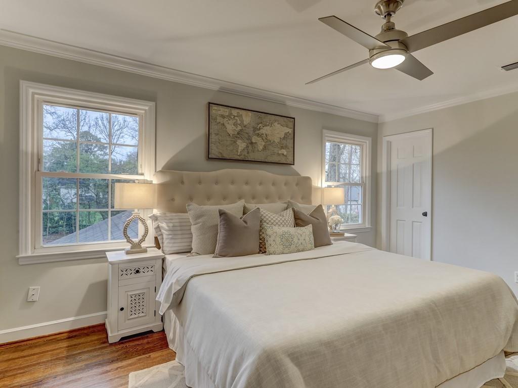 4234 Chevington Road Charlotte, NC 28226 - Photo 28 of 46 a bedroom with a large bed and a window