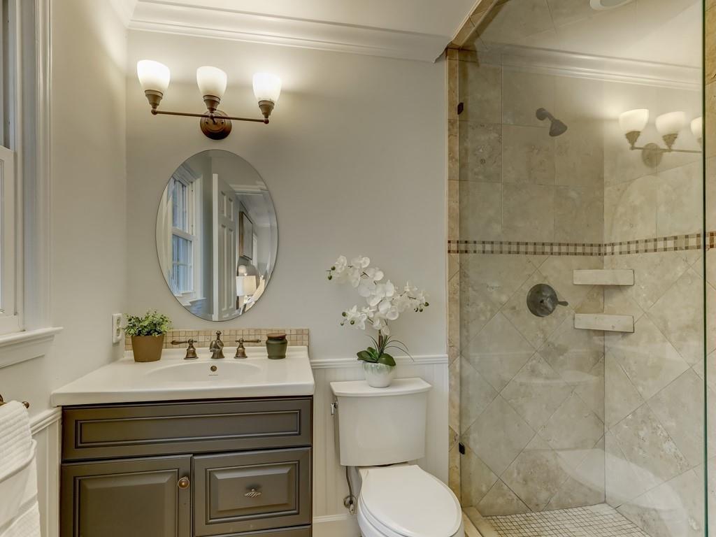 4234 Chevington Road Charlotte, NC 28226 - Photo 29 of 46 a bathroom with a sink a toilet and shower