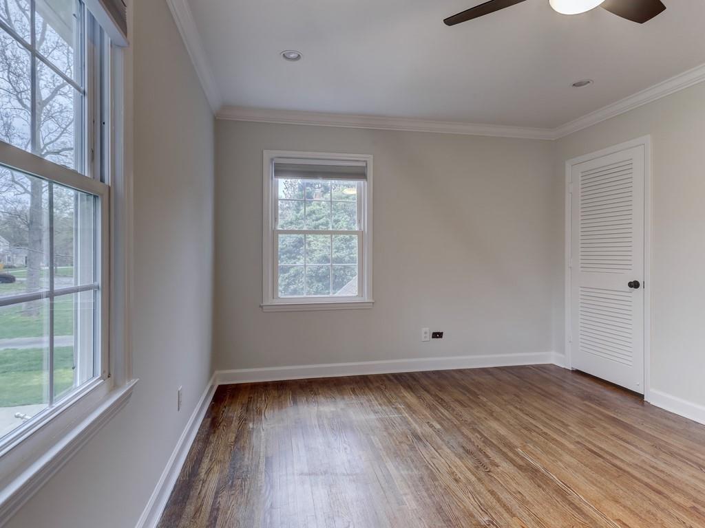 4234 Chevington Road Charlotte, NC 28226 - Photo 38 of 46 wooden floor in an empty room with a window