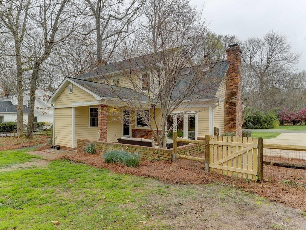 4234 Chevington Road Charlotte, NC 28226 - Photo 43 of 46 a view of a house with backyard and sitting area