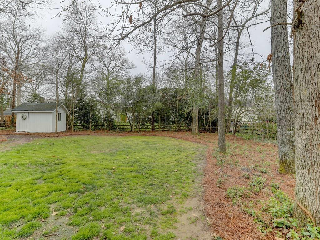 4234 Chevington Road Charlotte, NC 28226 - Photo 45 of 46 a view of a field with trees in the background