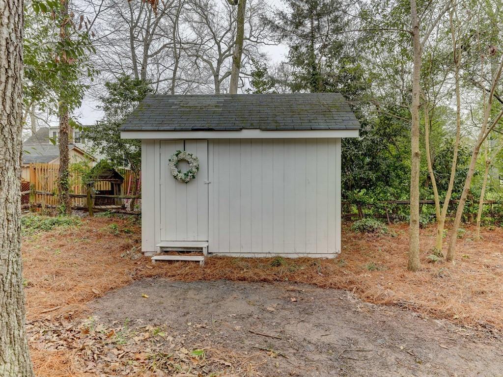 4234 Chevington Road Charlotte, NC 28226 - Photo 46 of 46 a backyard of a house with lots of green space