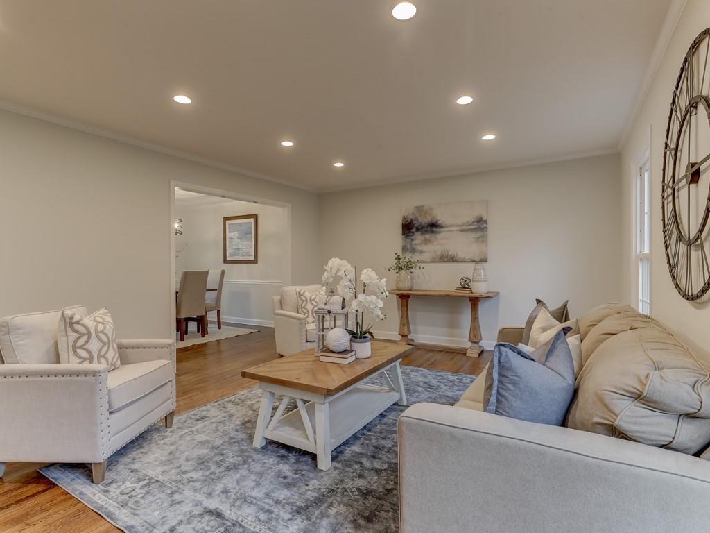4234 Chevington Road Charlotte, NC 28226 - Photo 5 of 46 a living room with furniture and a table