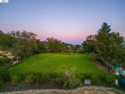 a yard with lots of green space