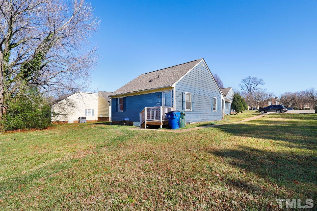 4541 Hargrove Road Raleigh, NC 27604 - Photo 22 of 24 a view of a house with a yard