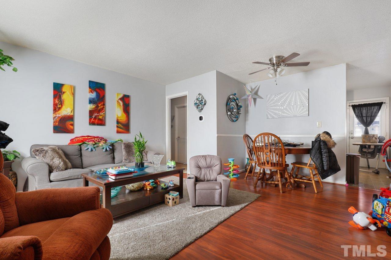 4541 Hargrove Road Raleigh, NC 27604 - Photo 6 of 24 a living room with furniture and wooden floor