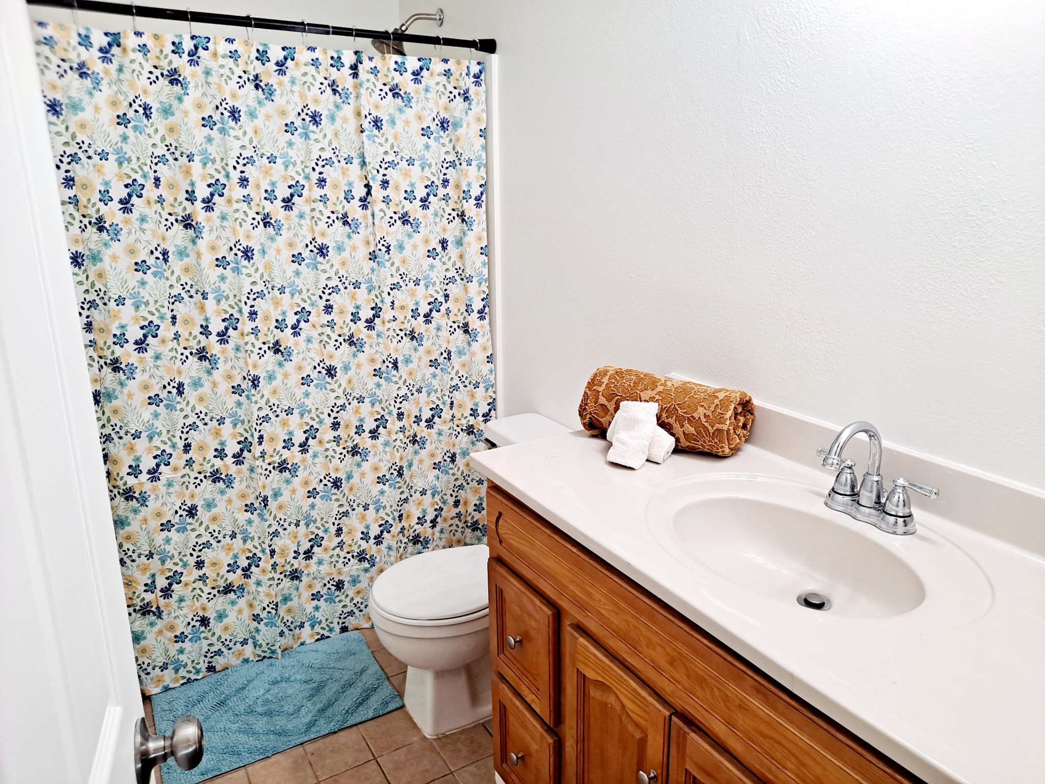 1228 Quail Road Nashville, TN 37214 - Photo 15 of 23 a bathroom with a sink toilet and shower