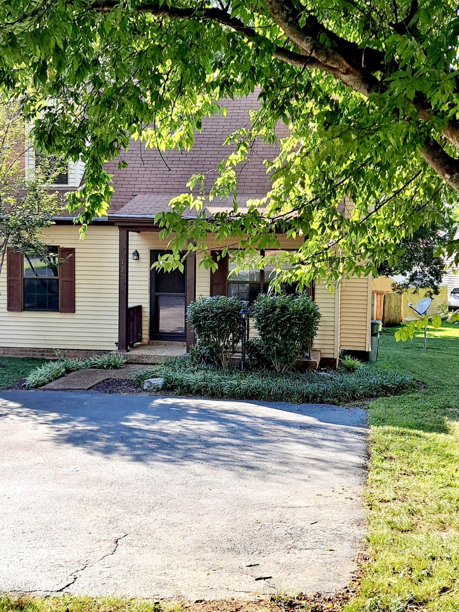 1228 Quail Road Nashville, TN 37214 - Photo 22 of 23 a front view of a house with garden